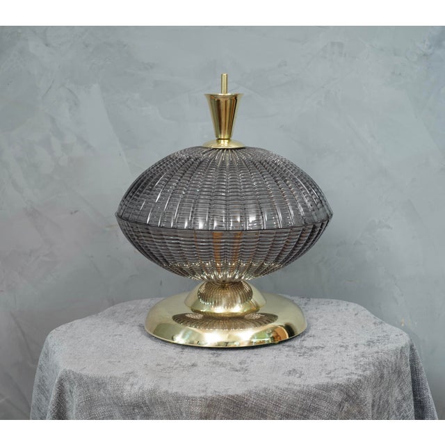 A very special and original Murano table lamps, a series of round glass arranged one on top of the other, in a smoked and...