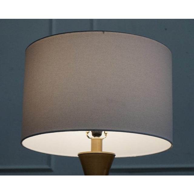 Lovely Gold Floor Lamp with White Shade. Measurements Height - 164cm Diameter - 48.5 cm Please note all measurements are...