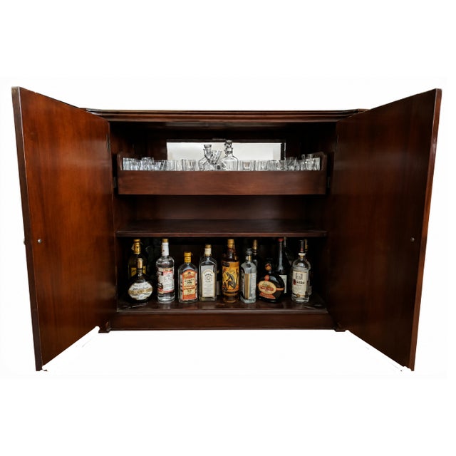 Bring timeless elegance to your dining room, living room, or entertaining space with this exceptional mid-century American...