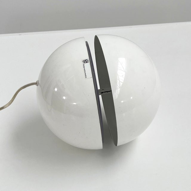 White Sphera Table Lamp by Andrea Modica for Lumess, 1970s, in Good conditions. Designed 1970 to 1979 This piece has an...
