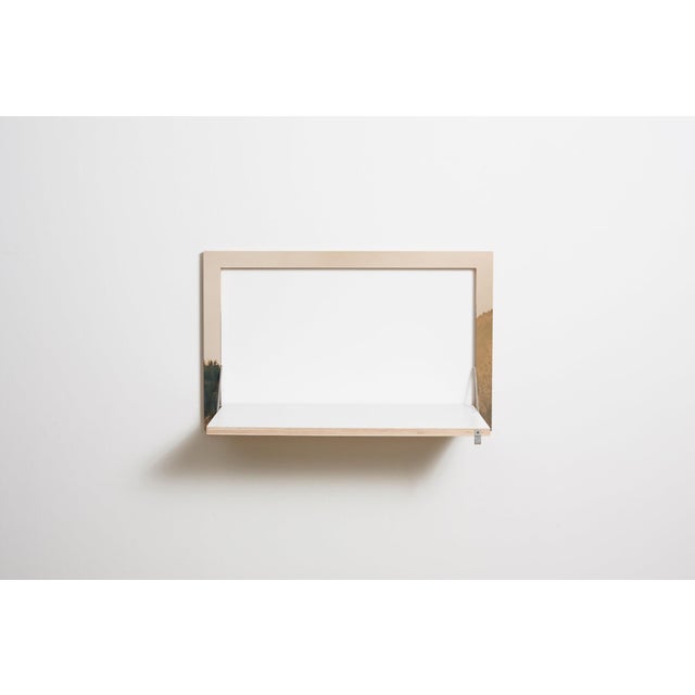 Wall art, workstation functional and discreet, this fläpps wall desk makes the perfect seated or standing workstation...