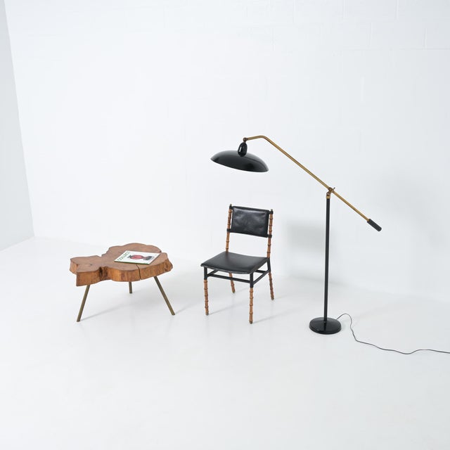 We attribute this beautiful floor lamp to Arredoluce. The plug is marked AL and the style of the lamp fits the style of...