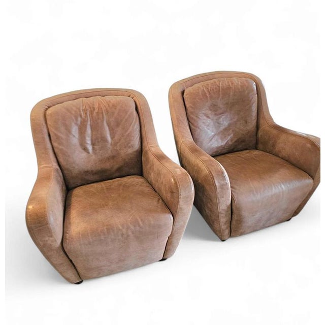 2 x Natuzzi lounge chairs / leather / 1980s 2 x Natuzzi lounge chairs / leather / 1980s This piece has an attribution...