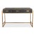A modern shagreen embossed leather-wrapped desk with a brass tone iron-framed base. Three drawers with marbleized paper-...