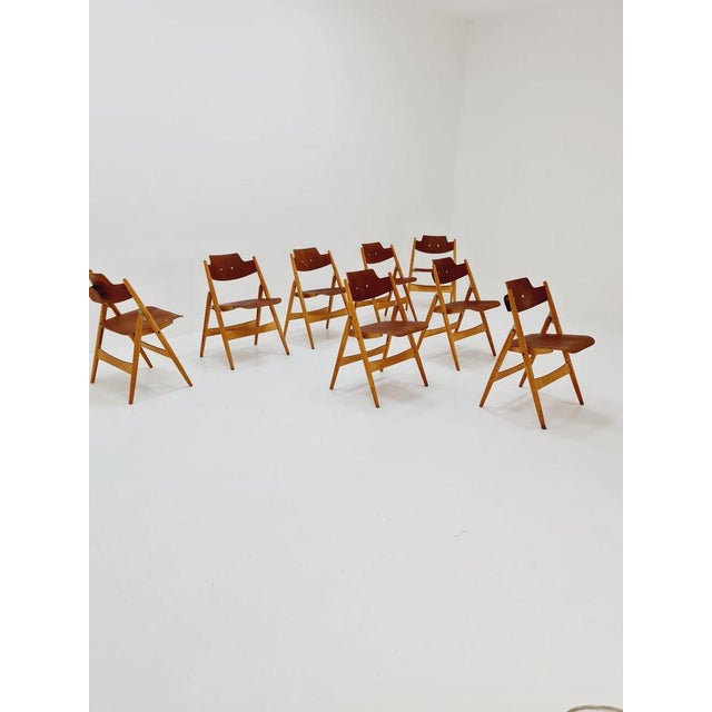 Austrian folding chair model SE18 by Egon Eiermann for Wilde & Spieth Designer: Egon Eiermann Manufacturer: Wilde & Spieth...