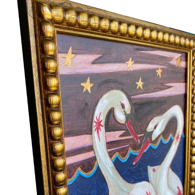 A captivating and deeply romantic original painting by artist Tatiana Duperault. Two swans face one another against a...