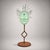 A sculpture by pino signoretto, characterized by a strong sculptural component and refined glasswork. the blown glass face...