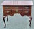 Antique 18th century Queen Anne mahogany lowboy (or dressing table) featuring classic cabriole legs with pad feet and an...