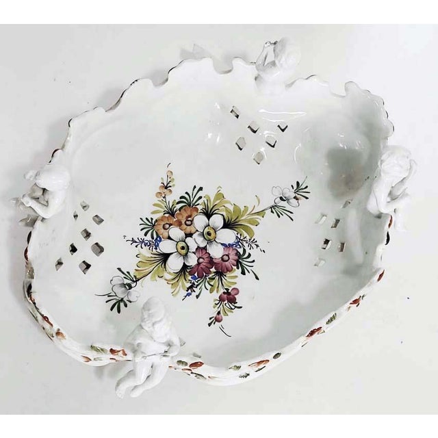 Rare antique Capodimonte porcelain reticulated centerpiece bowl surrounded by 4 putti cherubs each playing a musical...