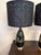 This pair of Atomic gold and black ceramic lamps are striking by themselves but the shades are another level entirely. The...