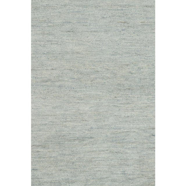 Made with hand-knotted wool and silk, this 8x10 contemporary rug is a rich new addition to Rug & Kilim’s Textural rug...