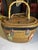 This antique Chinese woven wedding basket showcases traditional craftsmanship with its beautifully woven construction and...