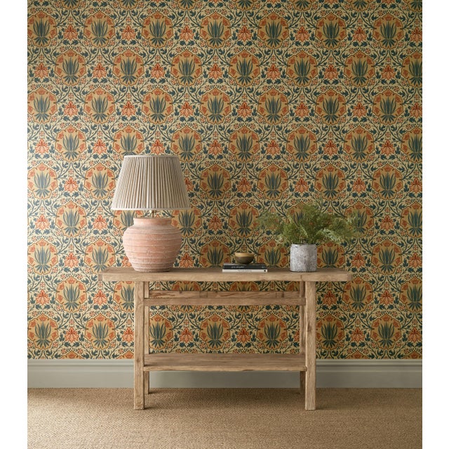 Retaining the striking shield motif of the original document Iris & Rose celebrates both flowers in a richly ornamental...