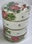 This charming ceramic box is painted with chrysanthemums and leaves on each tier and a bird on the top. There is also some...