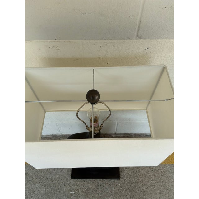 Stylish Currey & Co Avant Garde Table Lamp. Sculptural metal body with white rectangular shade. Original retail $1090....