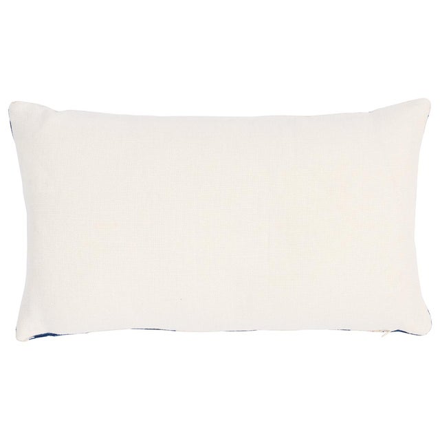 This pillow features Tutsi by David Kaihoi for Schumacher with a knife edge finish. Tutsi Velvet, designed by David...