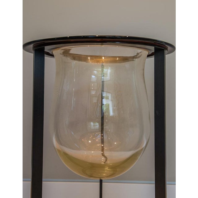 A striking sculptural object 'Canaletto' designed by Romeo Sozzi — combining a hand-blown Murano glass vessel with a...