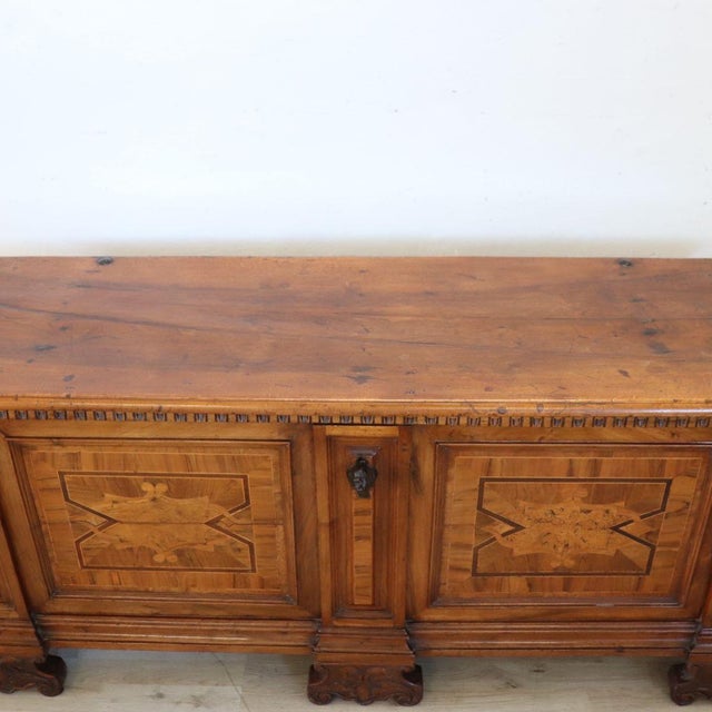 Majestic early 20th-century Italian chest. Crafted from solid walnut, its light amber brown color makes it perfect for...