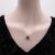 This 14k gold necklace has a minimal and sophisticated look with a black South Sea pearl as its centerpiece. The black...