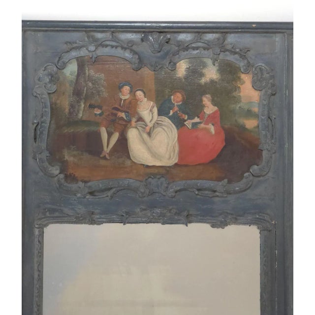 An Italian painted trumeau composed of antique elements.