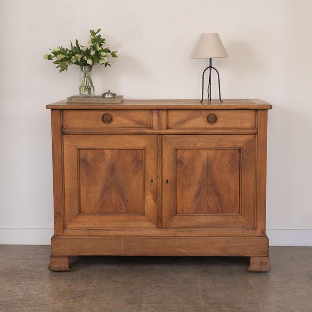 Beautiful oak cabinet from France, late 19th century. Lovely carved wood detailing on front doors with interior shelf and...