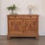 Beautiful oak cabinet from France, late 19th century. Lovely carved wood detailing on front doors with interior shelf and...