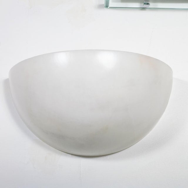 Single Art Deco inspired Spanish alabaster sconce. Each piece displays naturally occurring variations in color and veining.