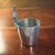 The Antique Abercrombie & Fitch Co. by James Dixon & Sons "One Finger" Jigger / Shot is a collectible barware item made of...