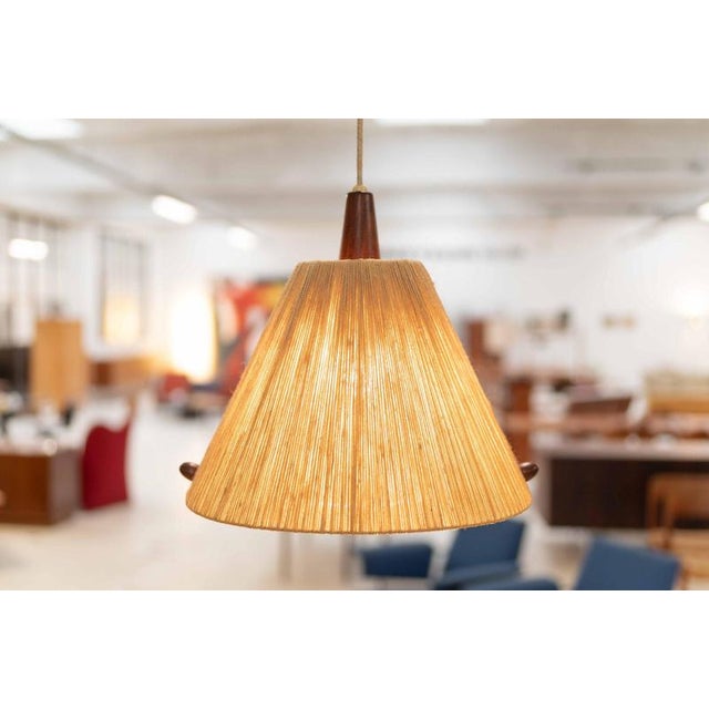This hanging ceiling lamp was designed and produced by temde leuchten in germany during the 1960’s. The style however is...