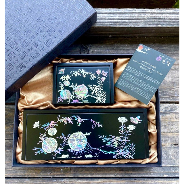 A finely crafted Korean mother-of-pearl lacquerware desk accessory set, presented in its original fitted gift box with...