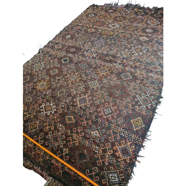 Elevate your interior design with this authentic, pre-1950s Kütahya cecim kilim. Masterfully hand-loomed in the heart of...