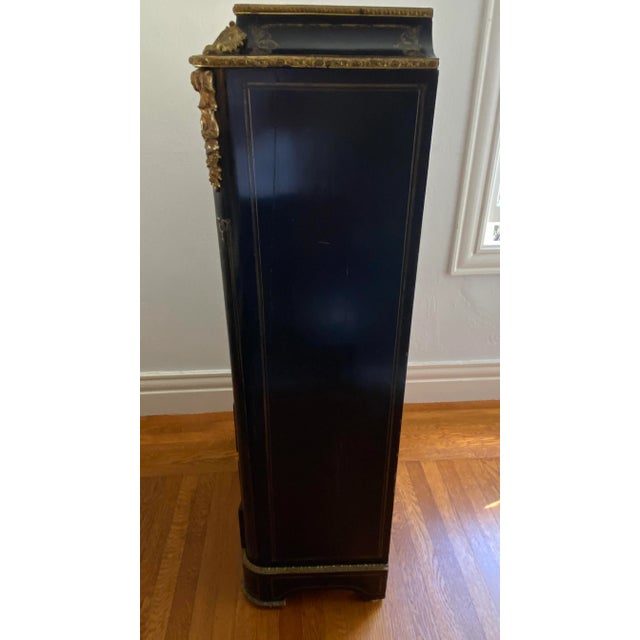 Beautiful and Refined French Secretary Cabinet from the Mid-19th Century Napoleon III Period. This 7 drawers...