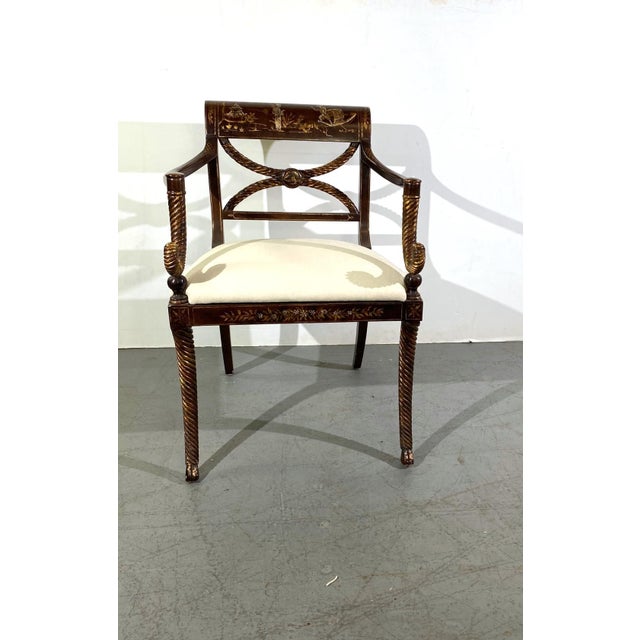 A pair of chinoiserie style armchairs. New upholstery