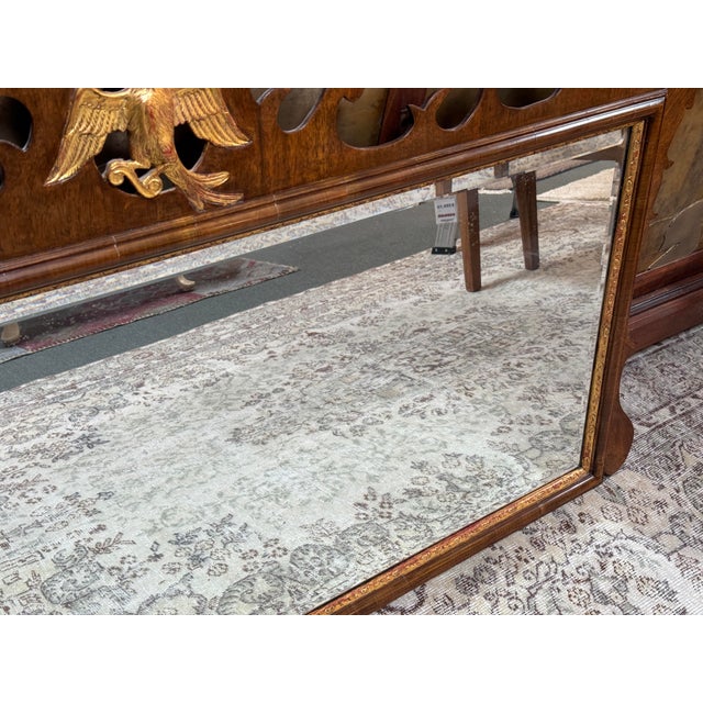 Design Plus Gallery presents a Federal Style Parcel Gilt Wood Mirror from Burton Ching. The mirror is made from walnut...