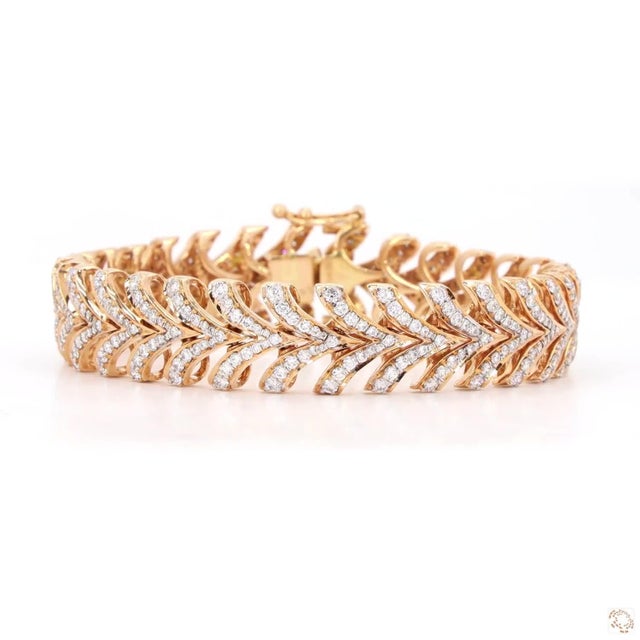 This bracelet from our contemporary estate collection centers on a 3.65-carat diamond in a round brilliant cut for lively,...