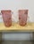 An elegant pair of authentic Murano glass vases, crafted according to Venetian artisan tradition. The vases feature a...