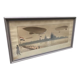 Gamy / Marguerite Montaut, Les Dirigeables Parceval et Gross en Manoeuvre à Cologne, Gouache & Lithograph, Framed For Sale