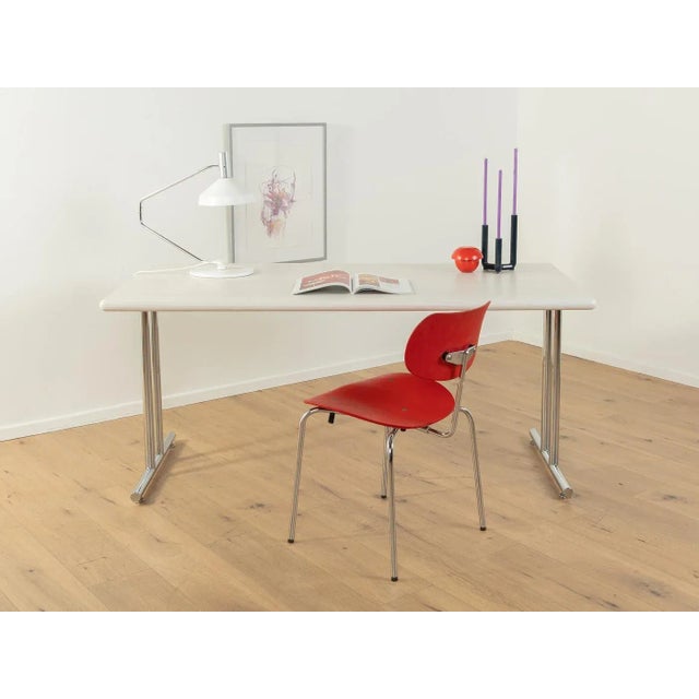 Classic desk from the 1980s. High-quality frame made of chrome-plated steel with a white-stained ash table top with solid...