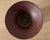 A sculptural American studio pottery pedestal vessel made in New York, combining a creamy speckled cylindrical base with a...