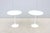 Fabulous pair of 20" round white laminate top tulip side tables designed by Eero Saarinen for Knoll. The Saarinen tulip...