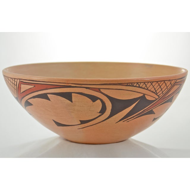 Southwest vintage Hopi style hand-coiled bowl with hand-painted traditional symbolic design elements in iron red and black...
