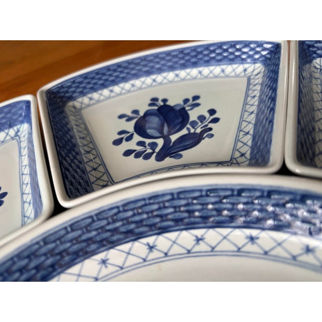 A rare vintage 9-piece cabaret / relish set from Royal Copenhagen in the collectible "Tranquebar" pattern (No. 11),...