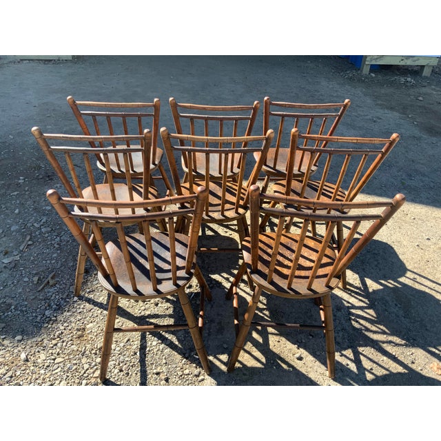 A rare set of eight 1820-30 maple matching double rod back plank seat farm chairs in outstanding condition. These chairs...