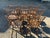 A rare set of eight 1820-30 maple matching double rod back plank seat farm chairs in outstanding condition. These chairs...