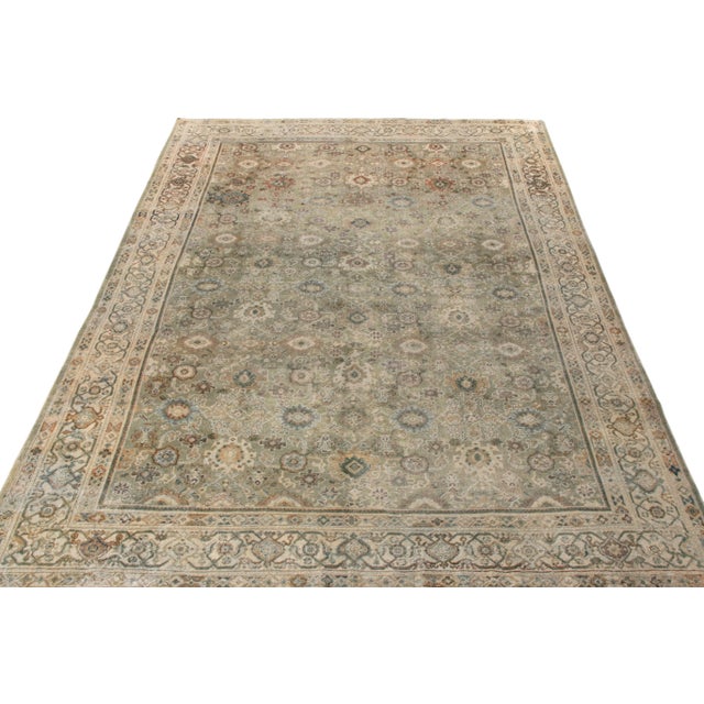 An 8x11 handknotted vintage ode to Sultanabad styles, originating from India circa 1950-1960 making way to Rug & Kilim’s...