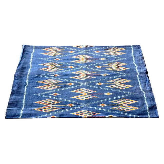 Offered is a remnant piece of Thai cotton Ikat fabric. It's a deep summer sky blue with a cream, yellow, and hot orange...