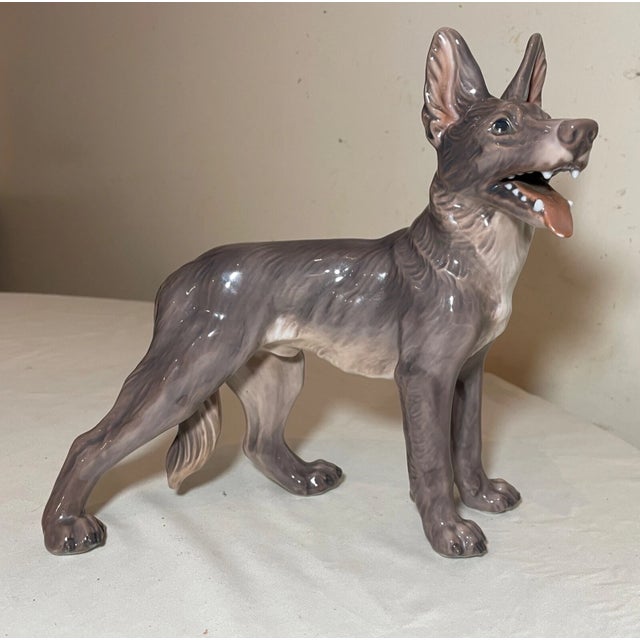 Up for sale is a very nice quality vintage Copenhagen porcelain dog statue by Dahl Jensen #1087. This lovely German...