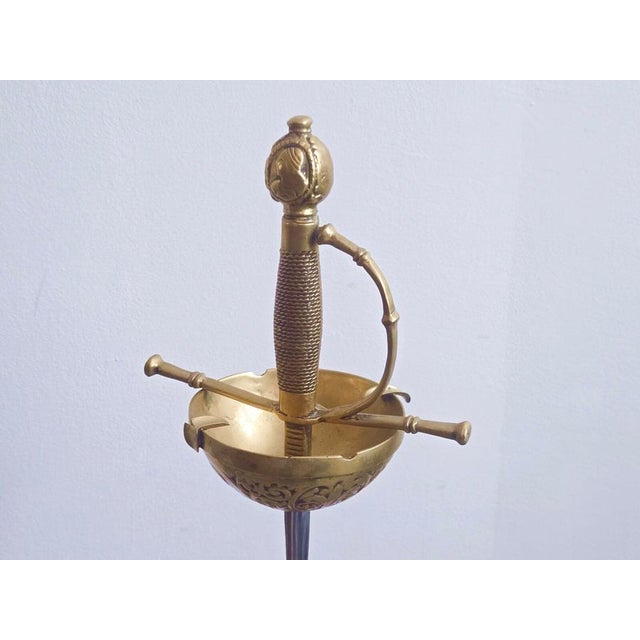 Good overall condition. Slight oxidation. The blade is not perfectly straight and the gold plating has faded. A small...