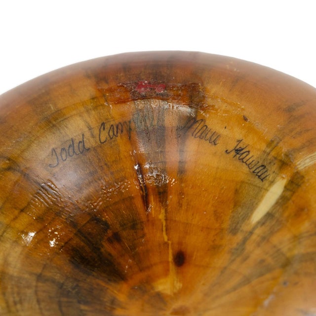 A hand-turned bowl by Maui-based wood artist Todd Campbell exemplifies the organic beauty and craftsmanship characteristic...