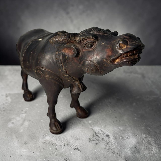 Antique Asian cast metal water buffalo ox sculpture with engraved decorative details and aged patina. Solid heavy metal...